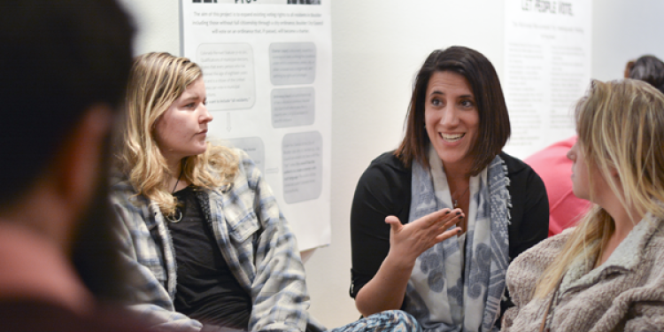 Student talking at an INVST event