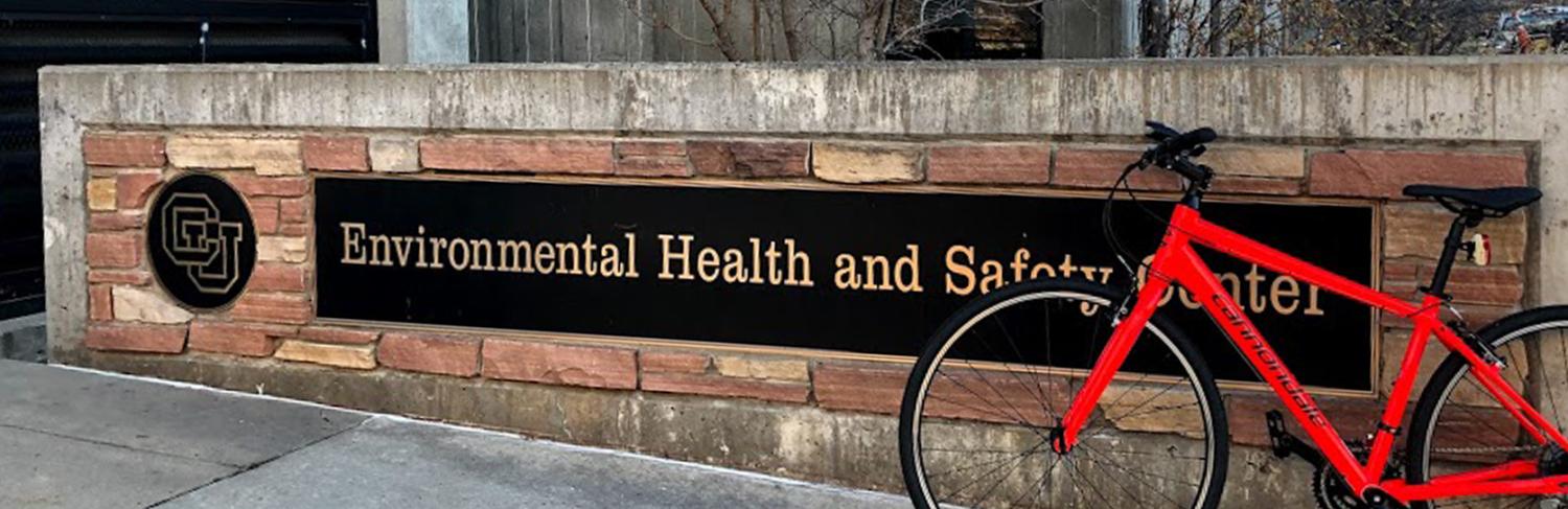 Bike in front of Environmental Health & Safety Center sign