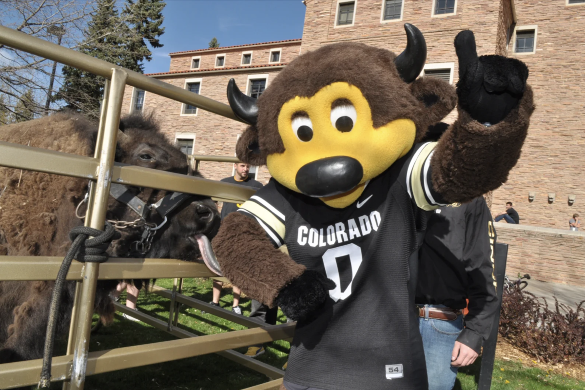 Chip posing with mascot Ralphie
