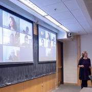 Students in class and on the screen