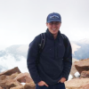 daniel broe standing on mountain top