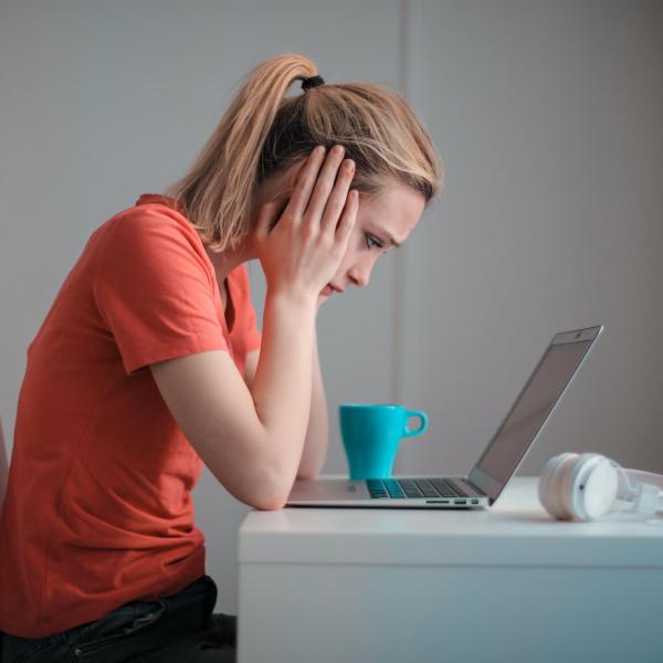 woman upset at computer