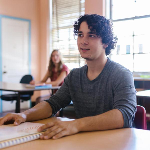 male student in classroom