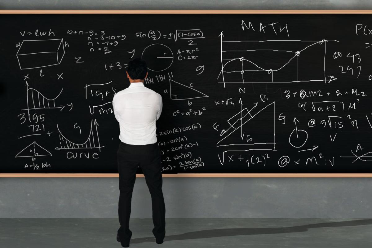 man at blackboard