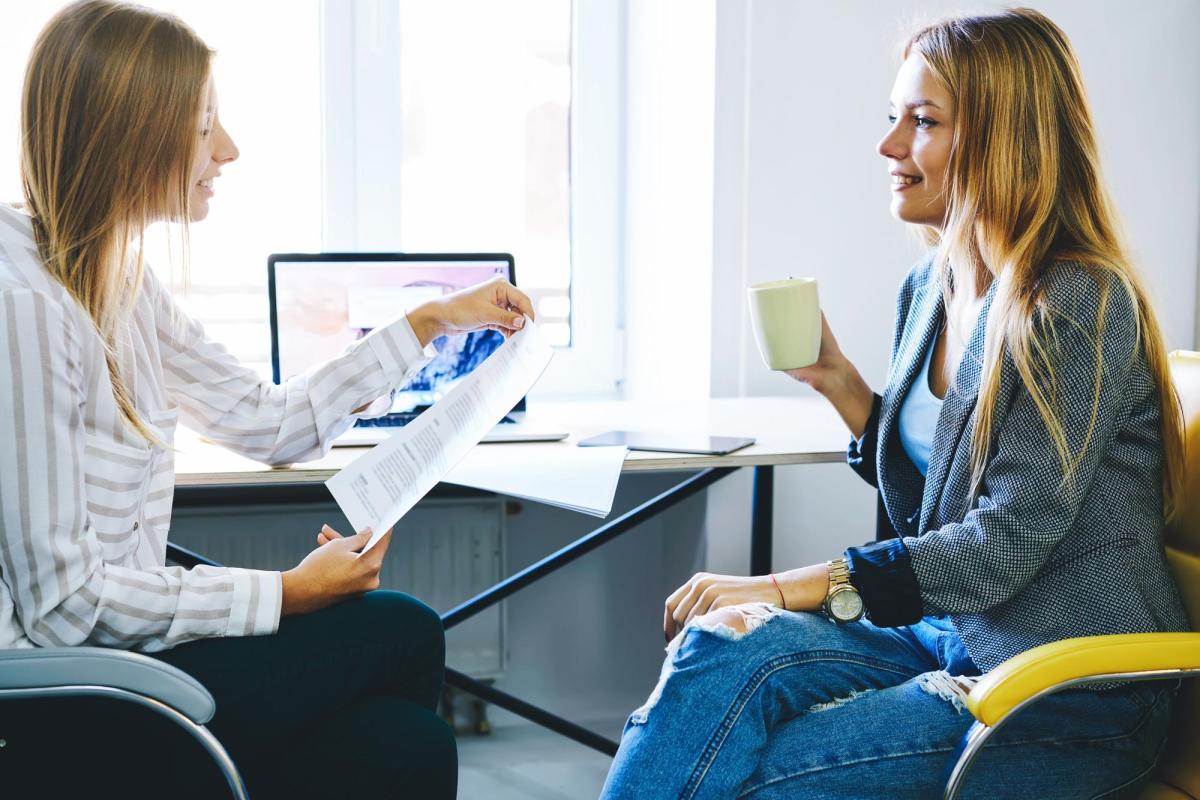 two women in a meeting