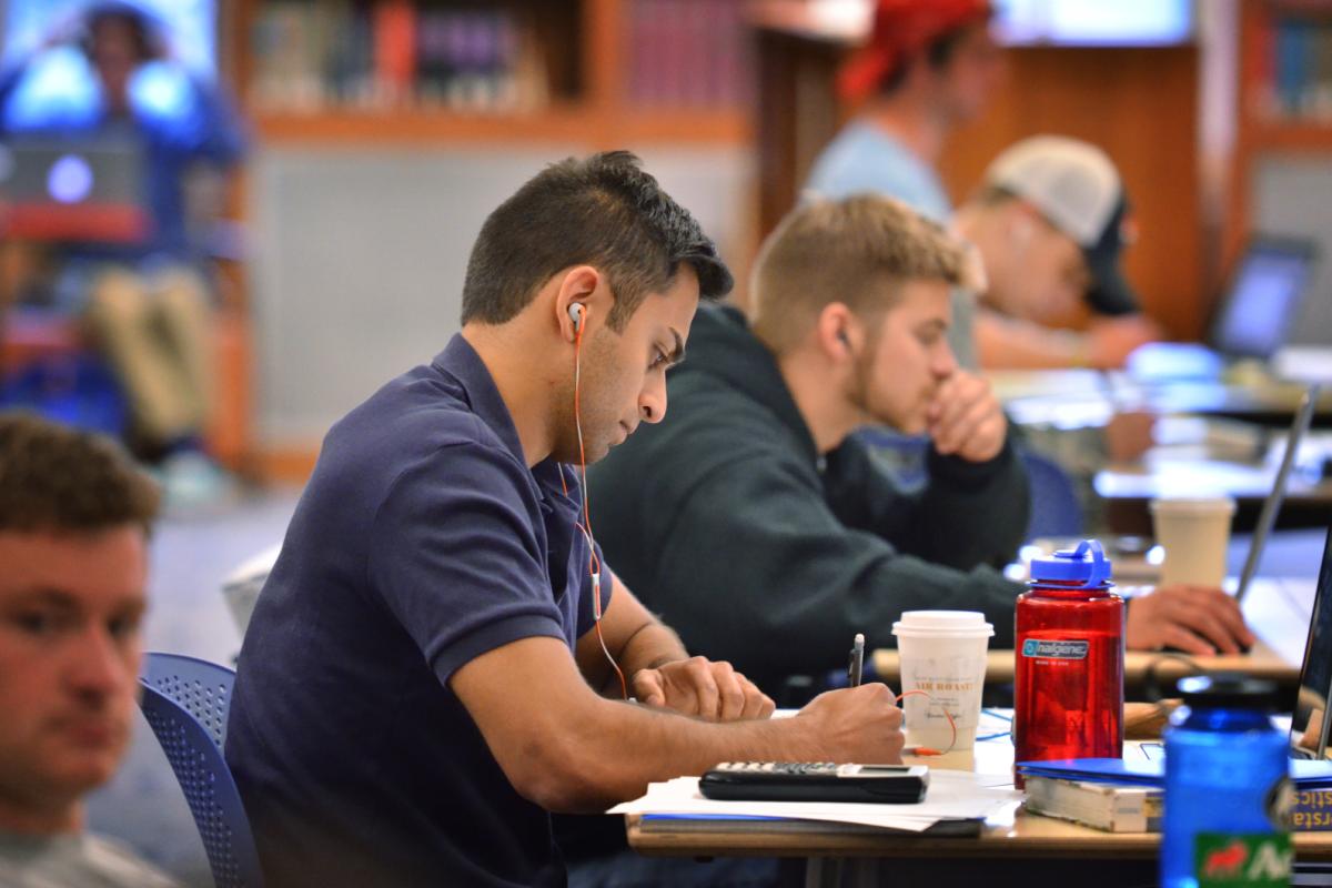 Student reading over notes