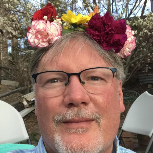 Scot Douglass wearing a flower crown