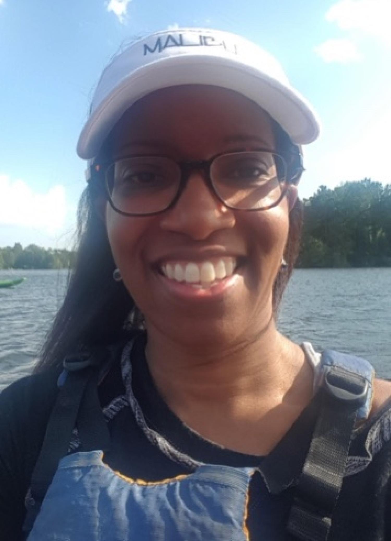 Female in kayak on lake