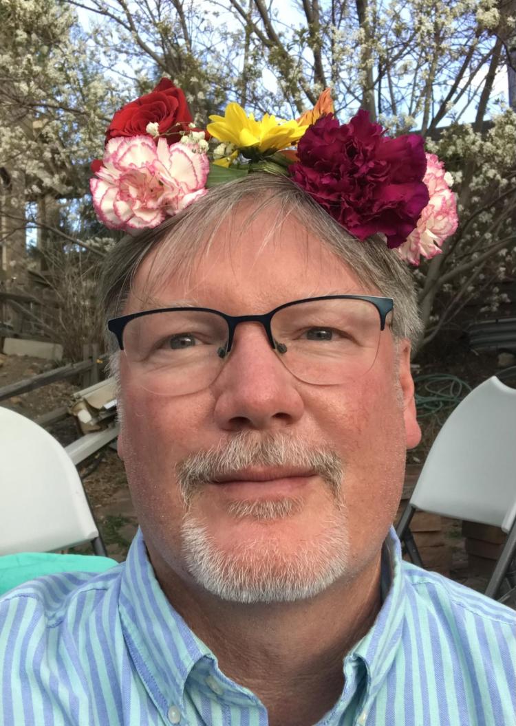 Scot Douglass wearing a flower crown