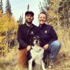 Josh with his wife and their dog