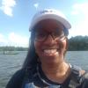 Female in kayak on lake