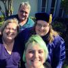 Rachel (in blue tam and gown) celebrates her PhD graduation with her family