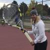 Karen Crofton with an oversized tennis racket