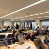 Groups of attendees work together during the education session on Nov. 11