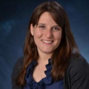 Abbie Liel portrait on blue background 