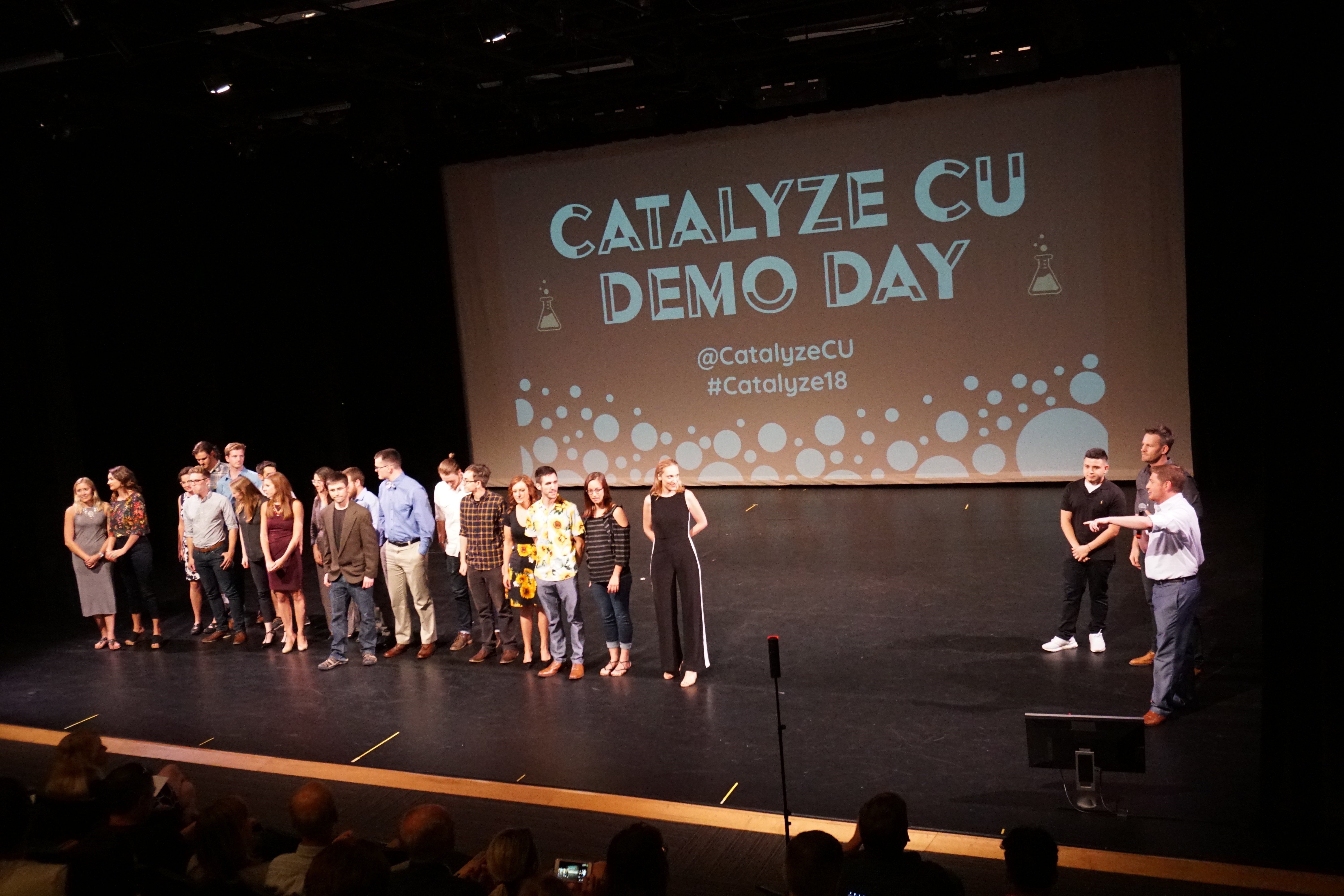 The founders line up on stage at the conclusion of Catalyze CU Demo Day. 