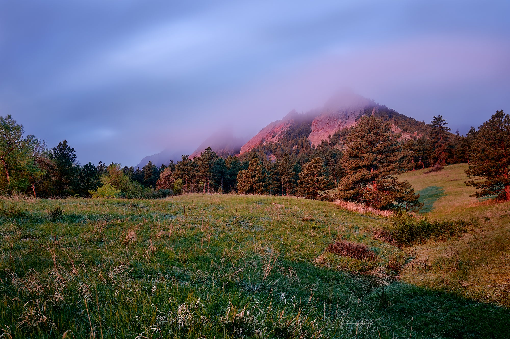 "Shimmer" by Kent Burkhardsmeier, showing clouds over the Flatirons