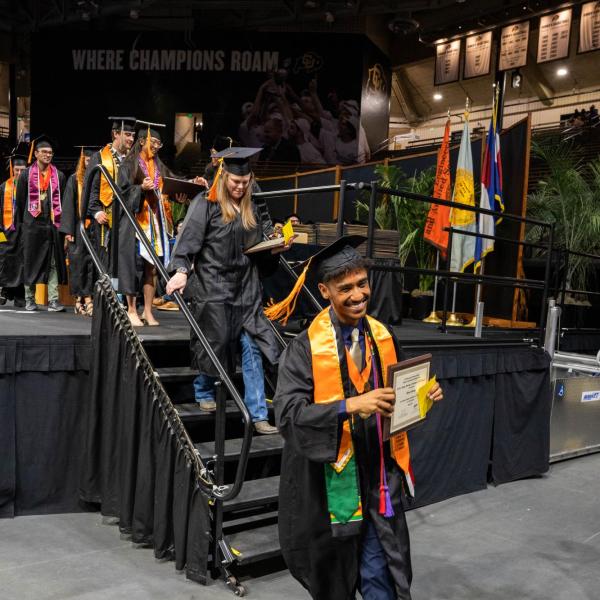 Graduate with diploma