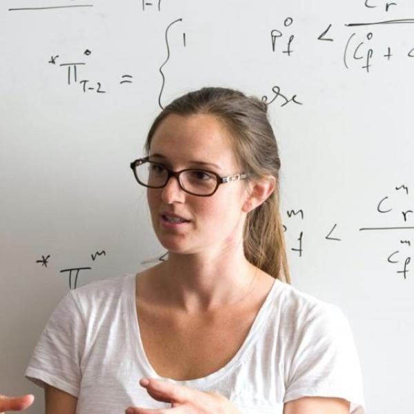 Two students talking in the lab