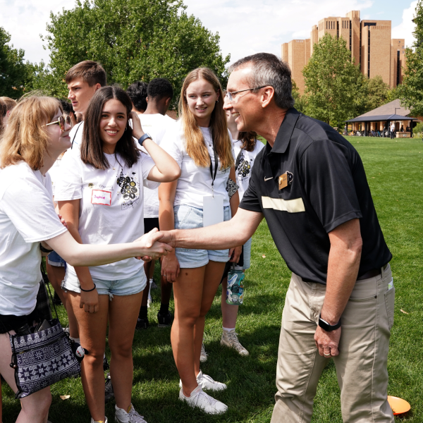 Dean Keith Molenaar speaks with Engineering Connections students participating in the Community Kickoff event.
