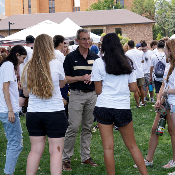 Dean Keith Molenaar speaks with Engineering Connections students participating in the Community Kickoff event.