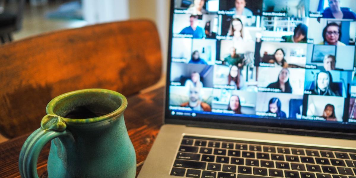 Image of computer zoom call with coffee on the side