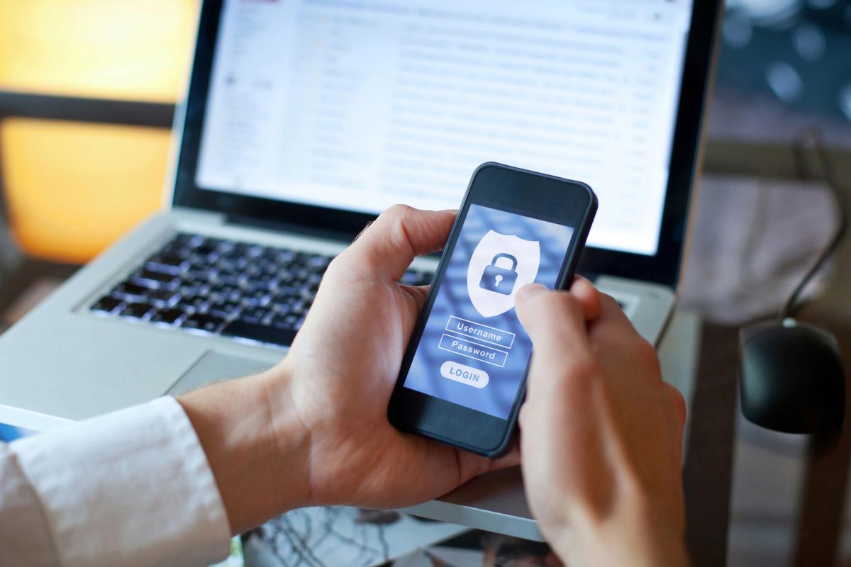 Illustration of data security on a laptop and phone