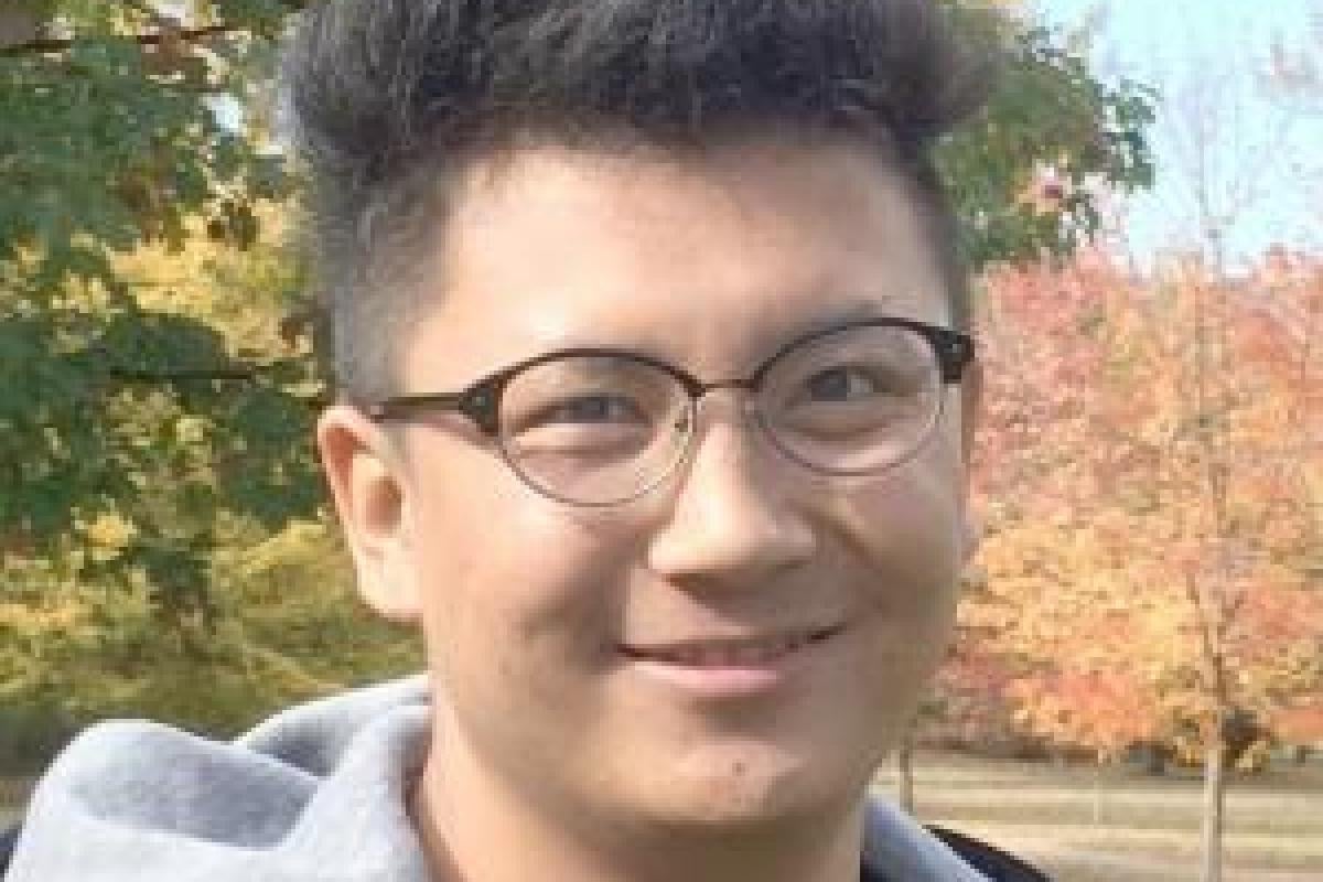 Dak Dou headshot