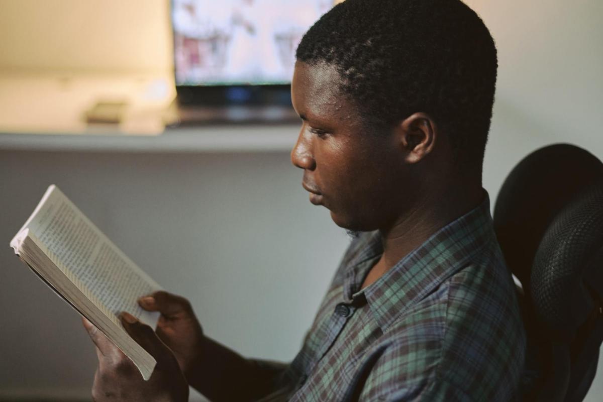 Student reading bible