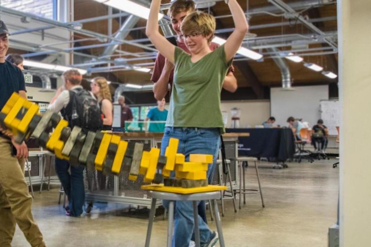 students playing jenga in the idea forge