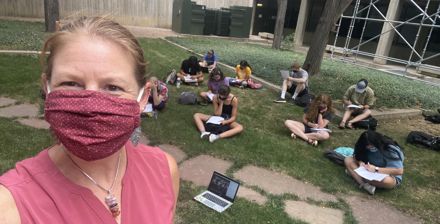 Malinda Zarske with students outside on campus