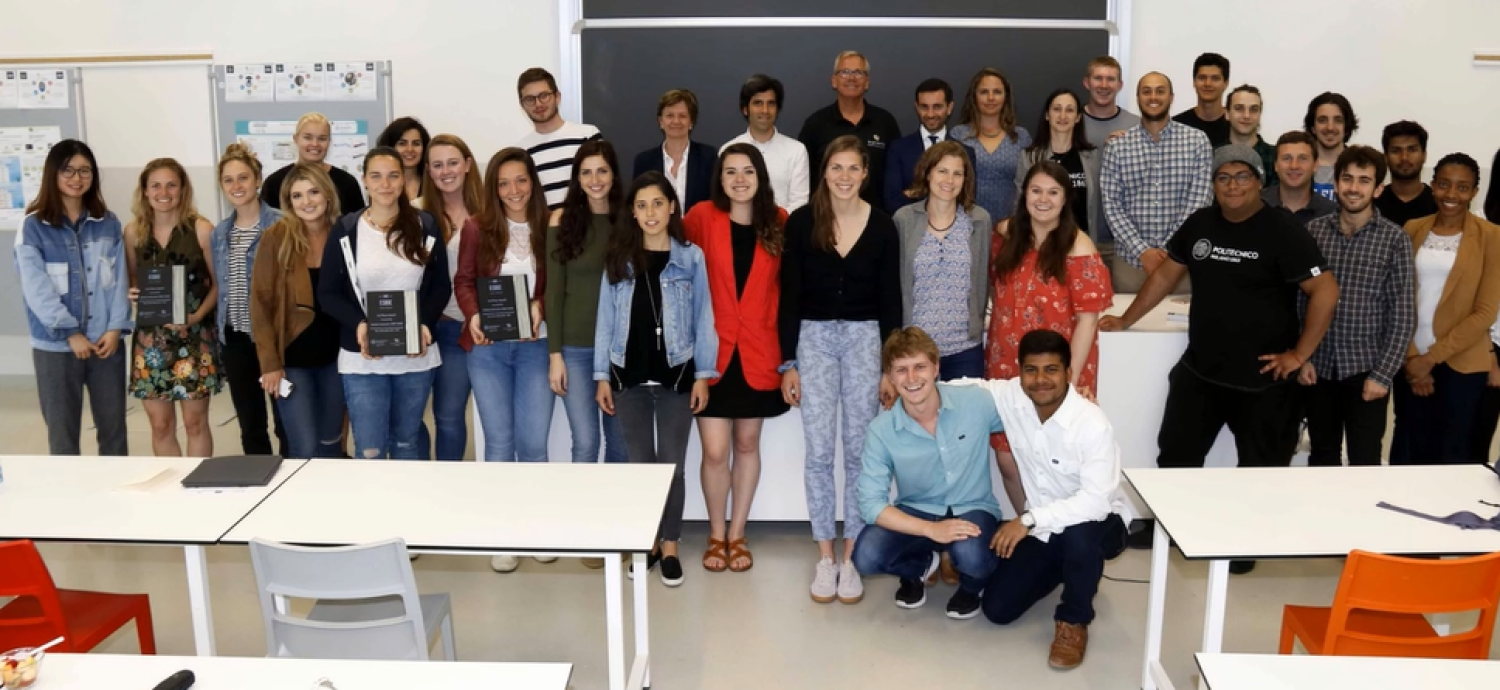 Students stand in a classroom in Lecco, Italy during a previous Global Intensive