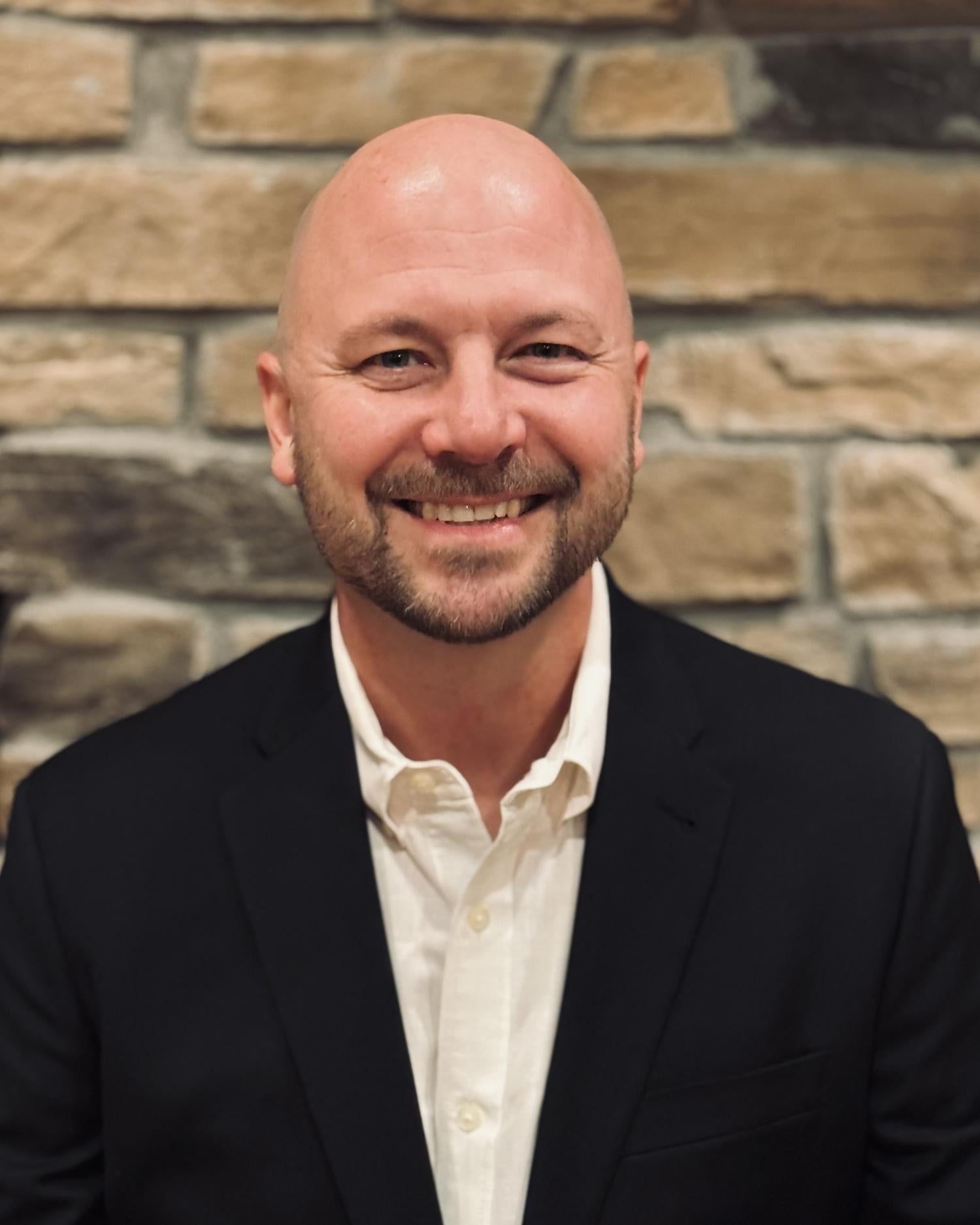 AEM Joe Poshusta headshot
