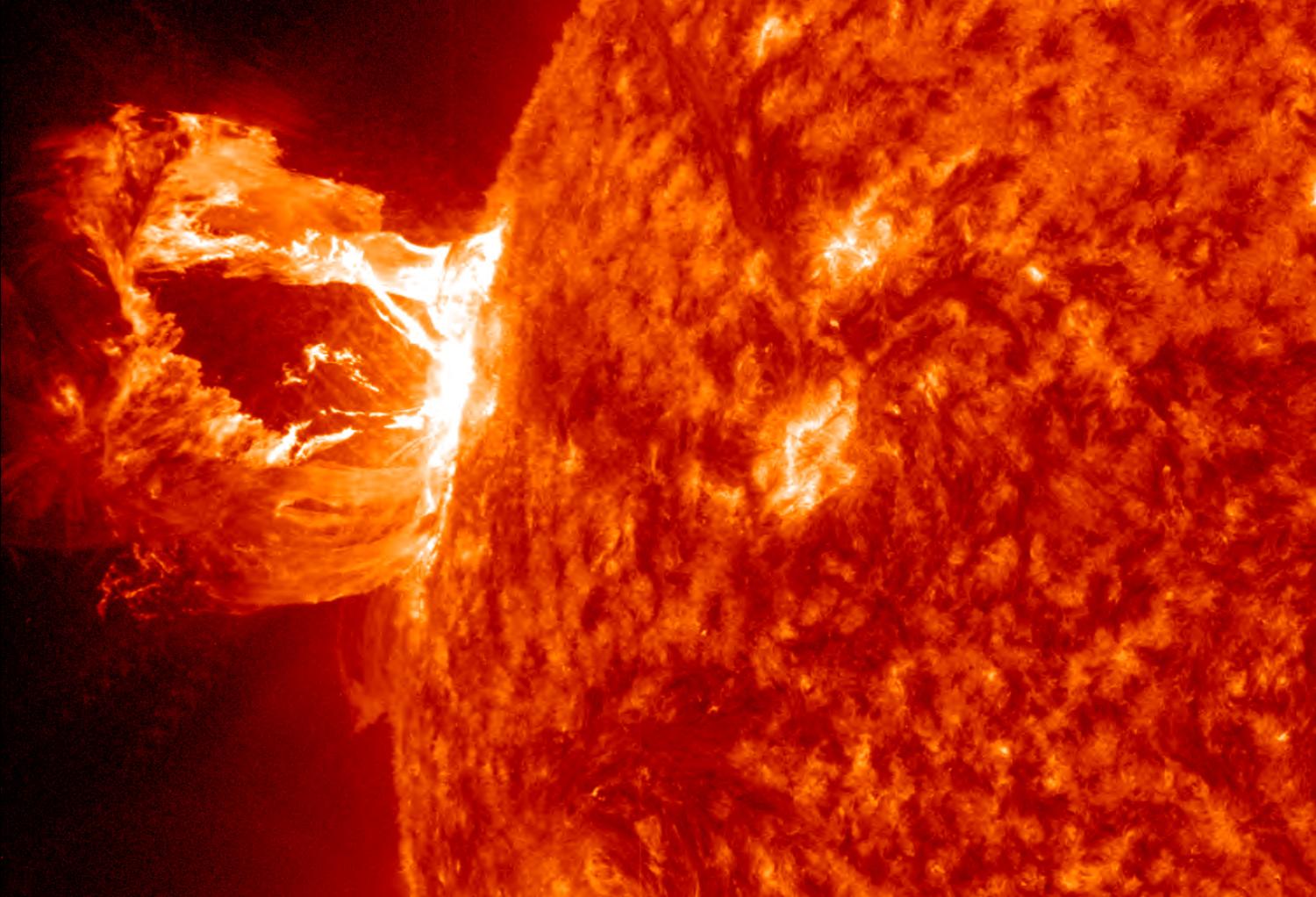 An eruption captured here by NASA's Solar Dynamics Observatory in the 304 Angstrom wavelength, which is typically colored in red.