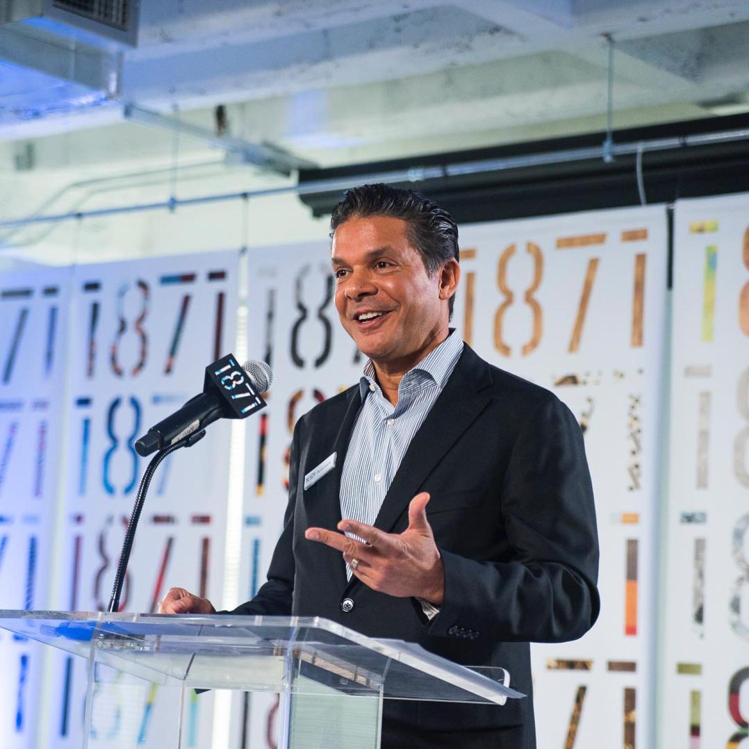 David Gupta speaks at an event.