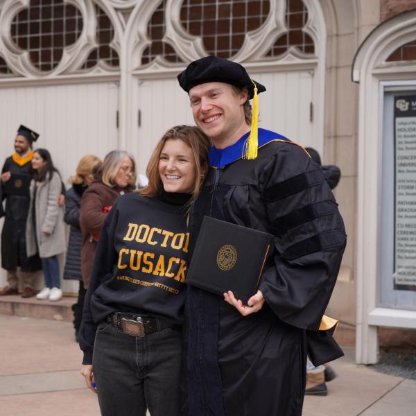 Graduate posing for picture