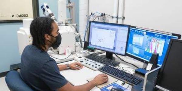 A student in the COSINC lab