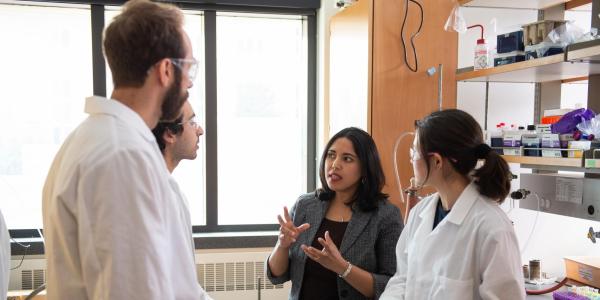 Chatterjee talking to a student group