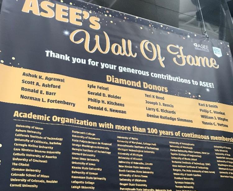 ASEE's Wall of Fame banner, with CU Boulder listed in the lower left.