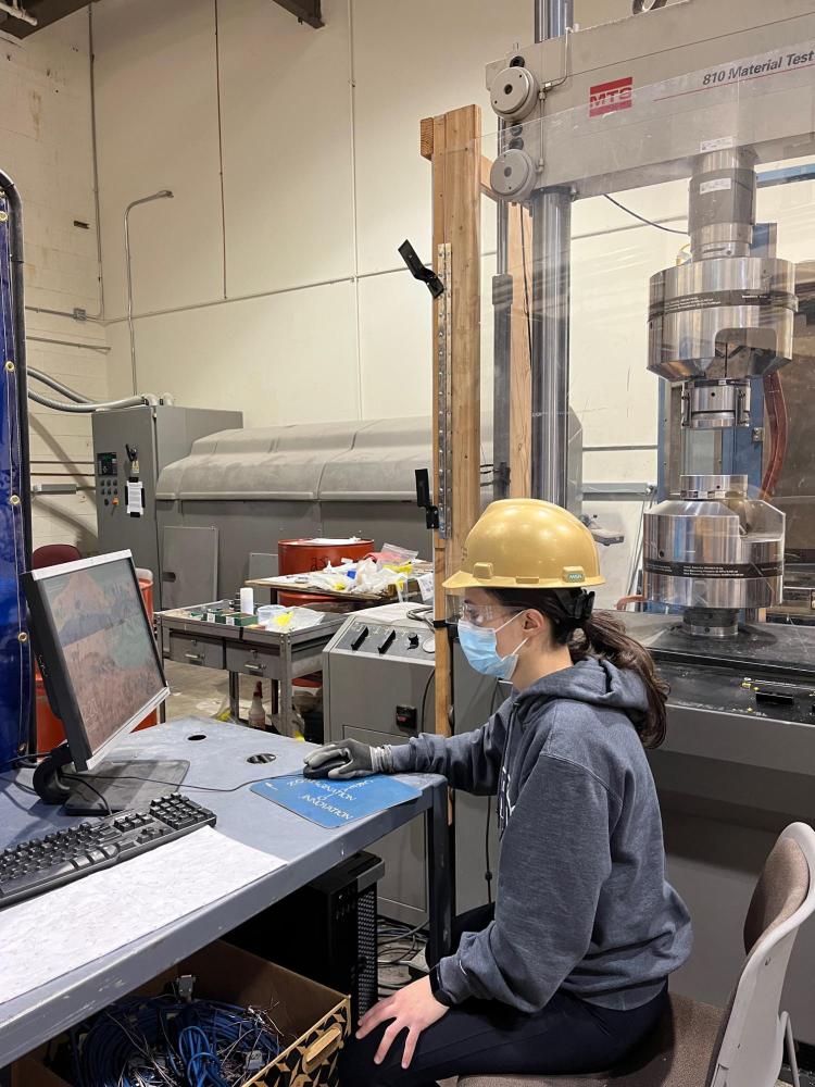 Student working in the lab on samples