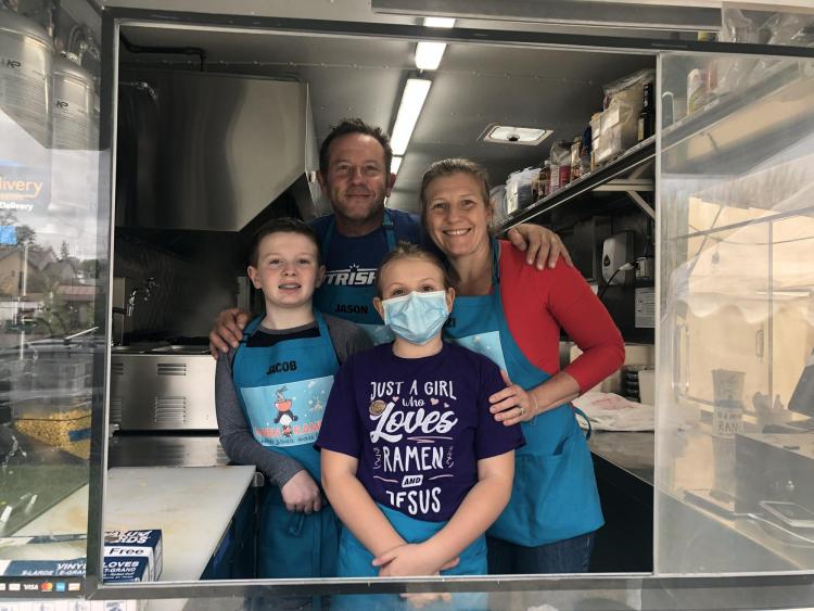 Jewett family prepares to serve from the Bamen Ramen food truck