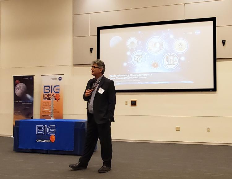 Calomino giving a presentation for NASA