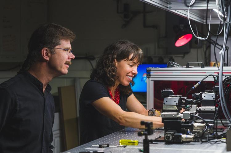Faculty working in electrical engineering lab at CU Boulder Engineering.