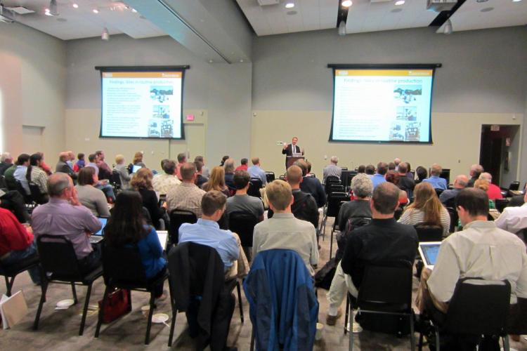 People in an auditorium for a workshop on air quality