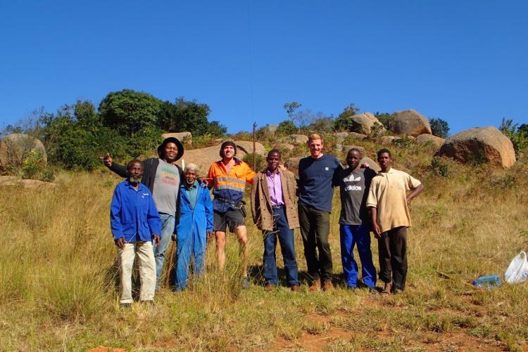 Team members with local leaders and members of the Gama family.