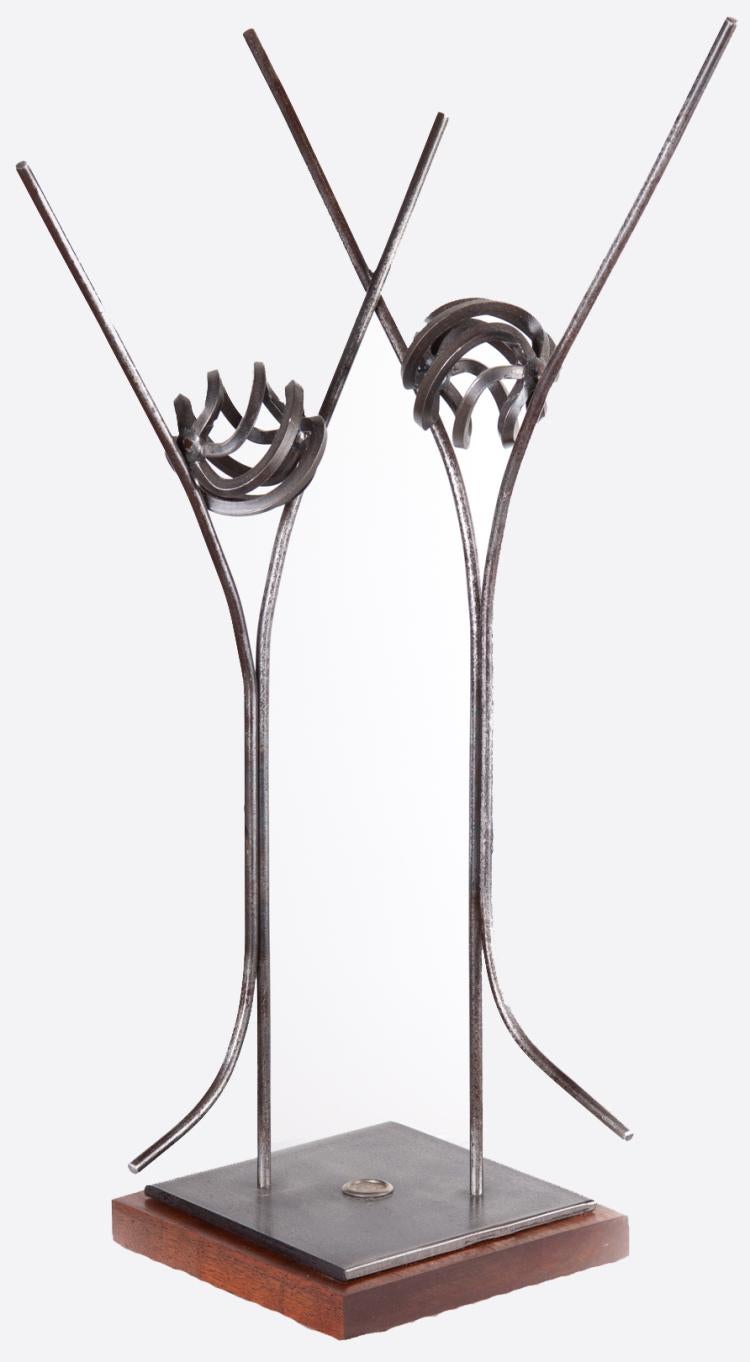 One of Hunt's sculpture's, depicting two figures with their arms outstretched