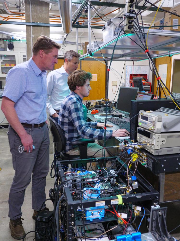 Scott Diddams and colleagues in the lab