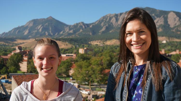 Stacy Hayes and Jennifer Perot with flatirons in background