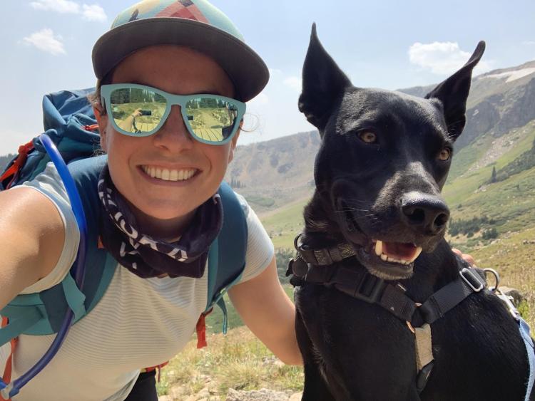Allison Anderson hiking with her dog