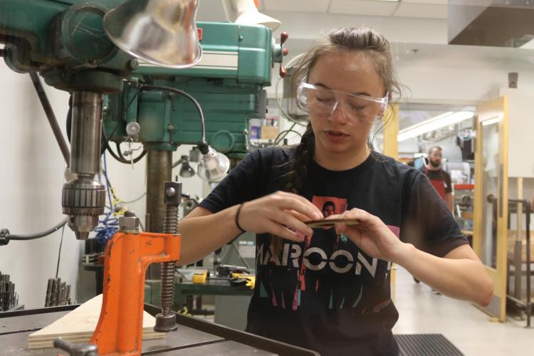 Alyvia Hildebrand works in the lab